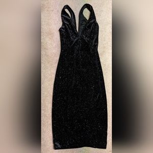 Black midi dress with plunging neckline and deep v back